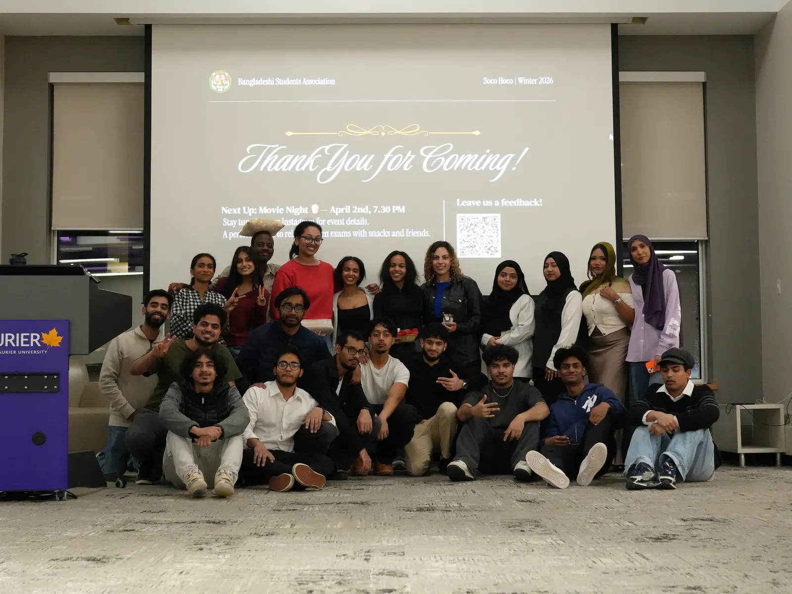 Members and guests posing in front of the 'Thank you for coming!' slide at Soco Hoco, March 2026.